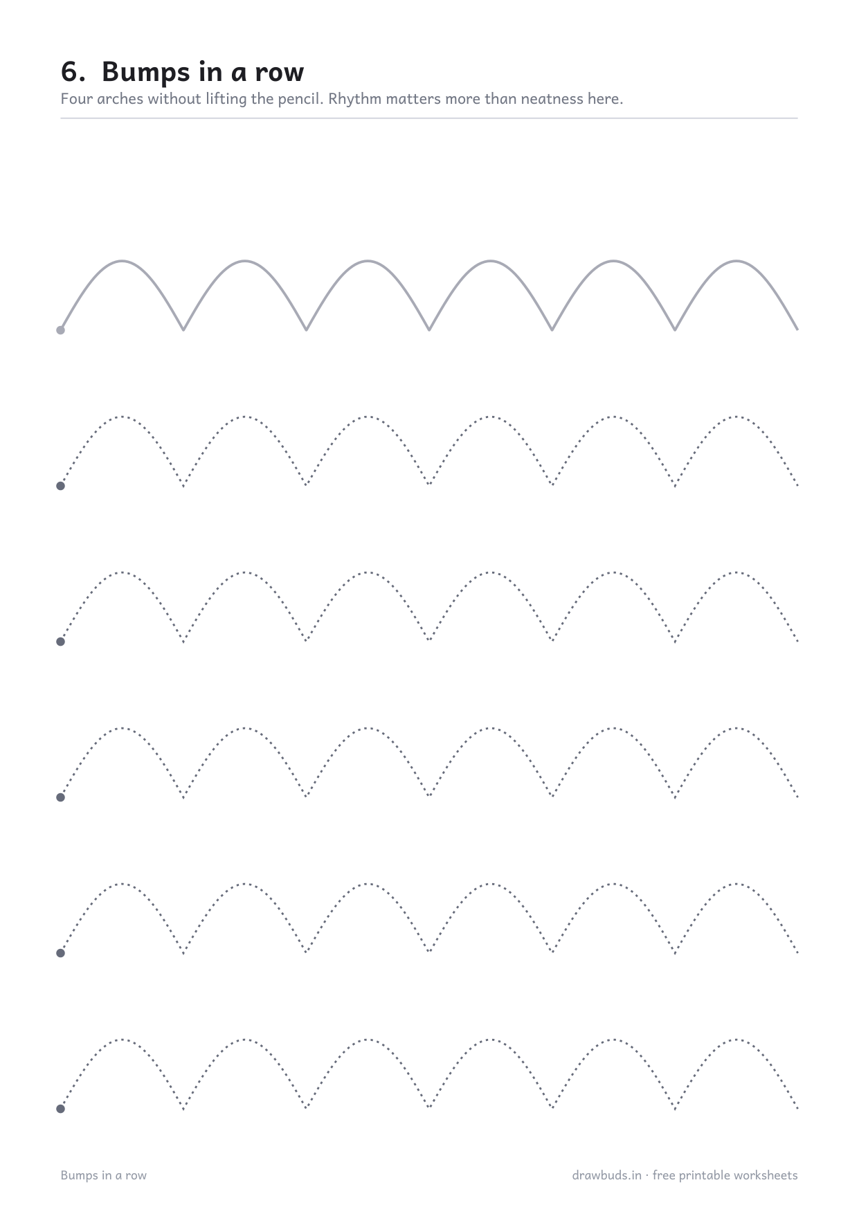Pre-writing worksheet with rows of bumps running across the page